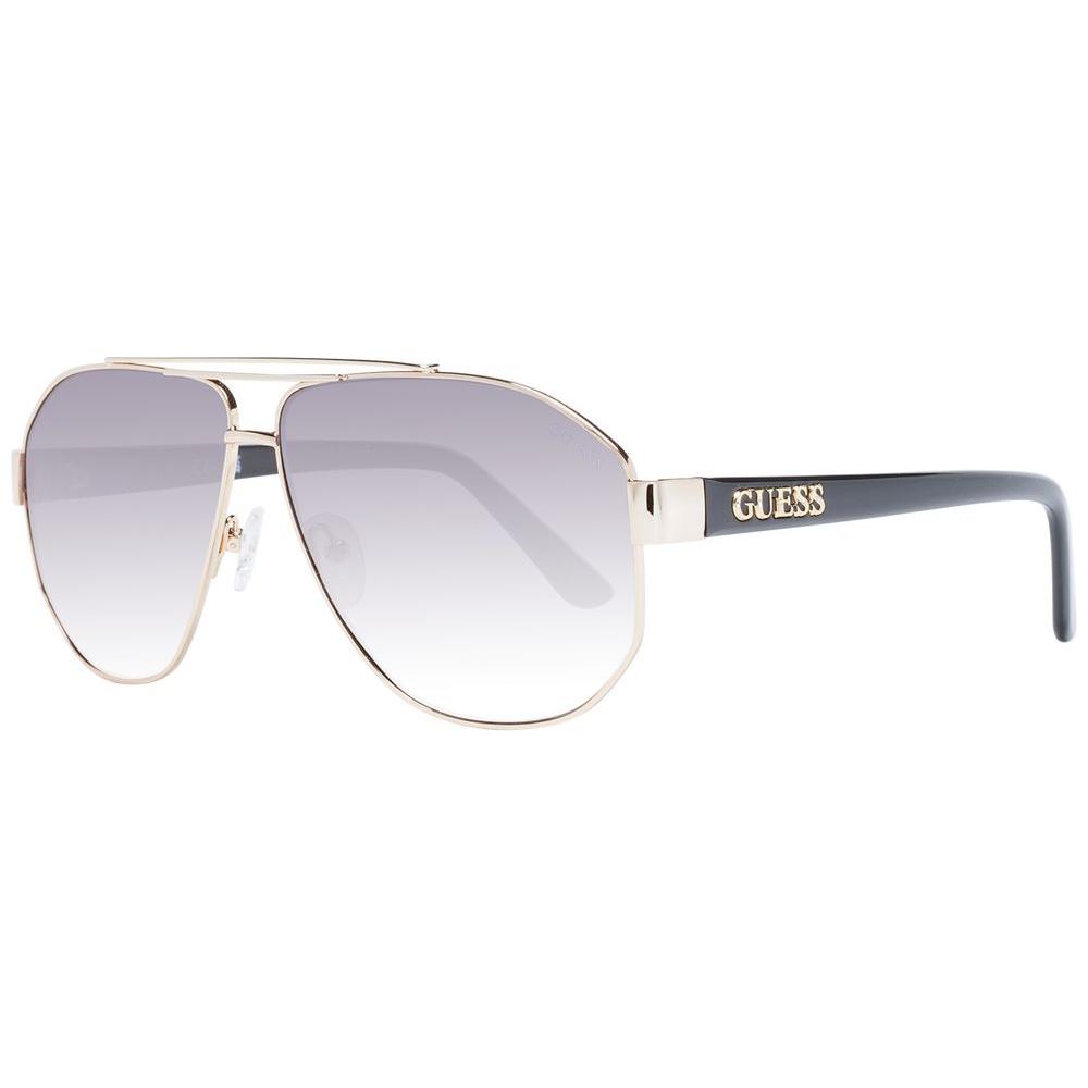 Guess gold women sunglasses with gradient grey lenses, metal aviator frame, full-rim, 100% UVA & UVB protection, comes with branded case.