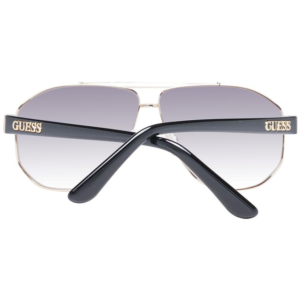 Guess gold women sunglasses with grey gradient lenses, metal frame, full-rim aviator style, includes branded case, 100% UVA & UVB protection.