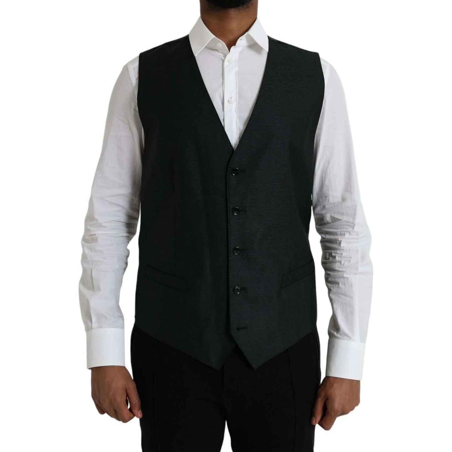 Dolce & Gabbana black wool waistcoat dress vest with adjustable strap and button closure, worn over a white shirt.