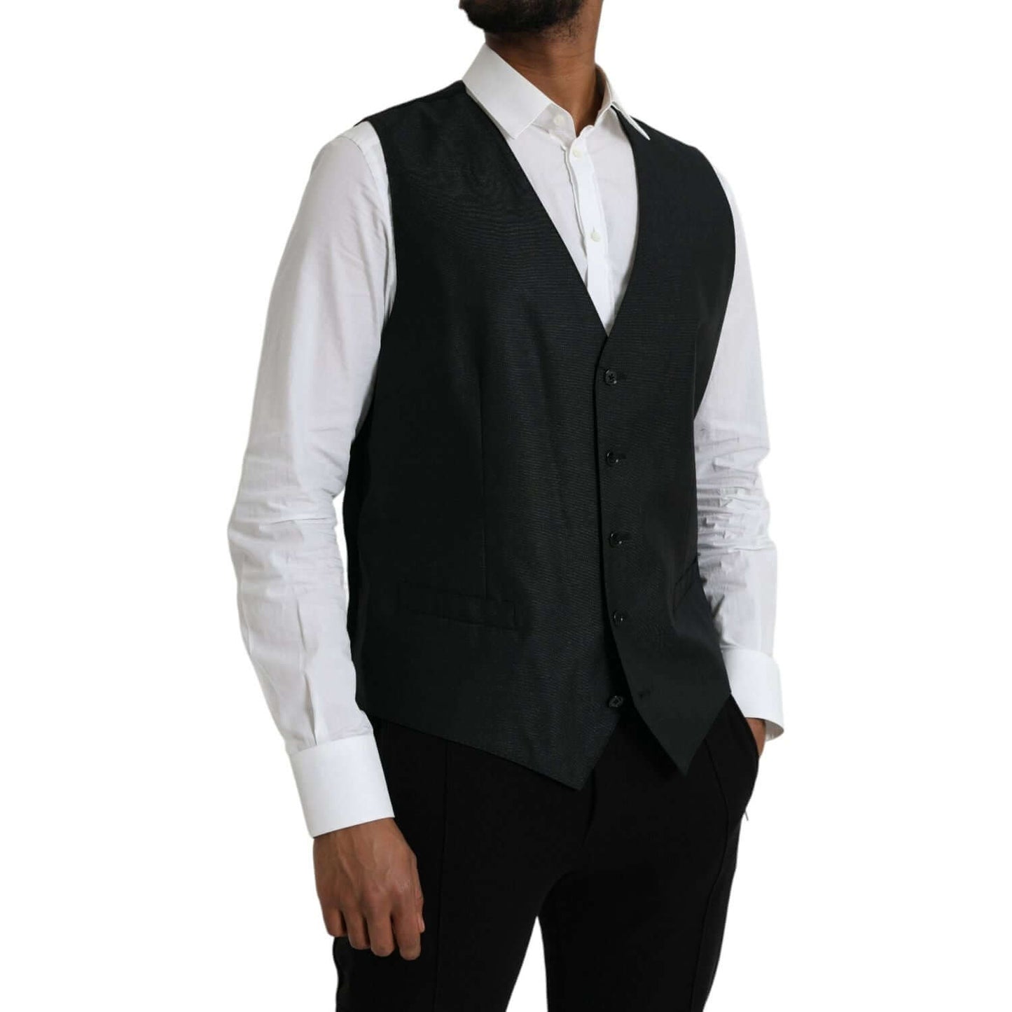 Dolce & Gabbana black wool waistcoat dress formal vest with adjustable strap, worn over white shirt. Luxury fashion made in Italy.