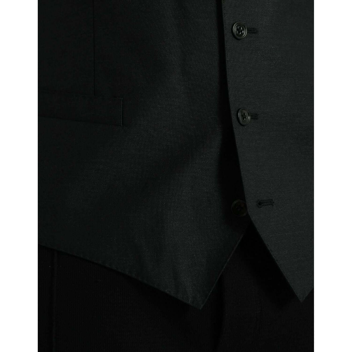Dolce & Gabbana black wool formal vest with button closure and adjustable waist strap, made in Italy.