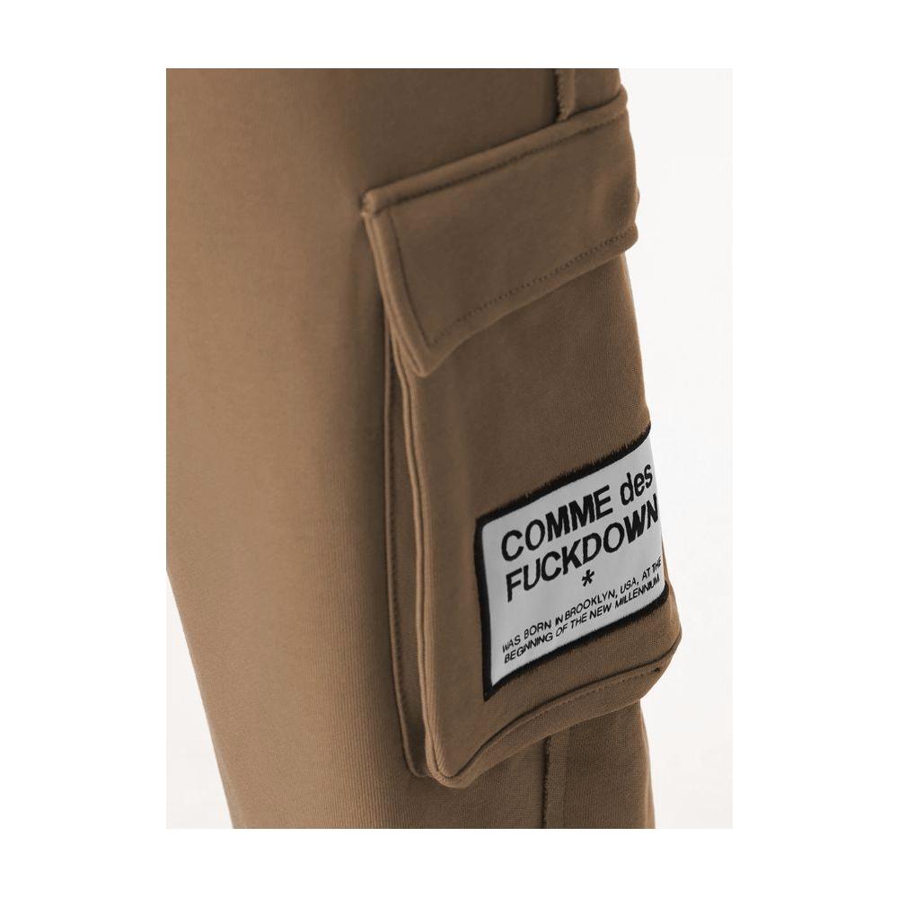 Comme des Fuckdown brown fleece pants with logo patch on cargo pocket and adjustable drawstring waistband.