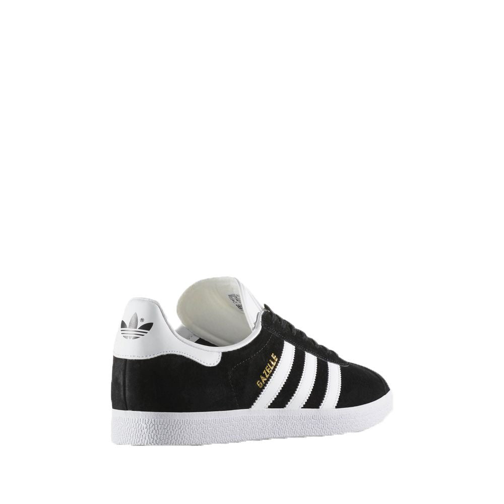 Adidas Gazelle BB5476 black sneaker with white stripes, durable polyurethane, and iconic logo design on white background.