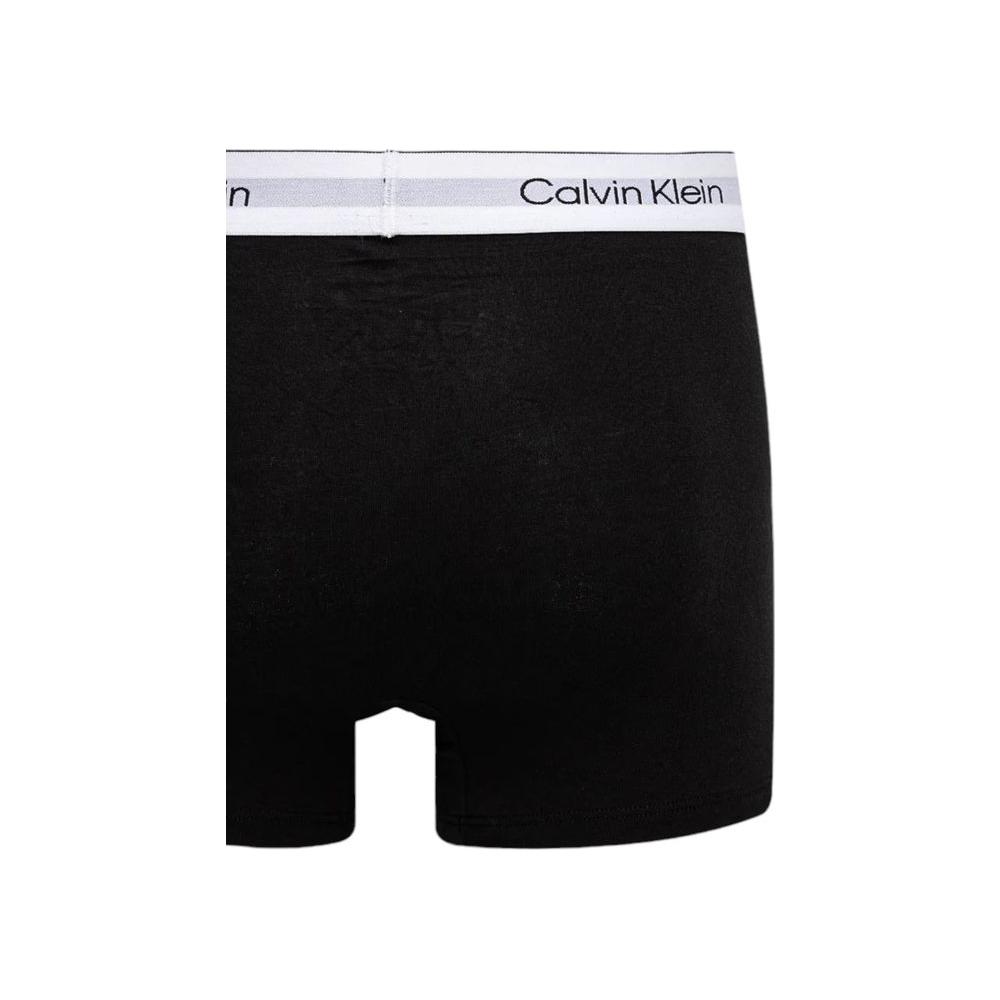 Calvin Klein gray cotton boxer shorts with logo waistband, 3-pack, offering comfort and style, made of 95% cotton and 5% elastane.