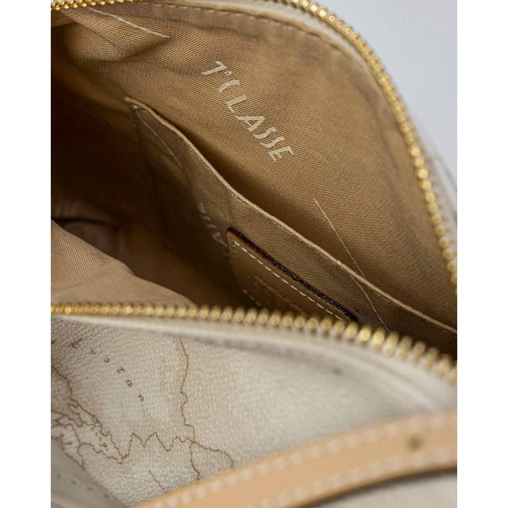 Interior view of Alviero Martini Prima Classe white leather handbag, showcasing the brown lining and signature details.