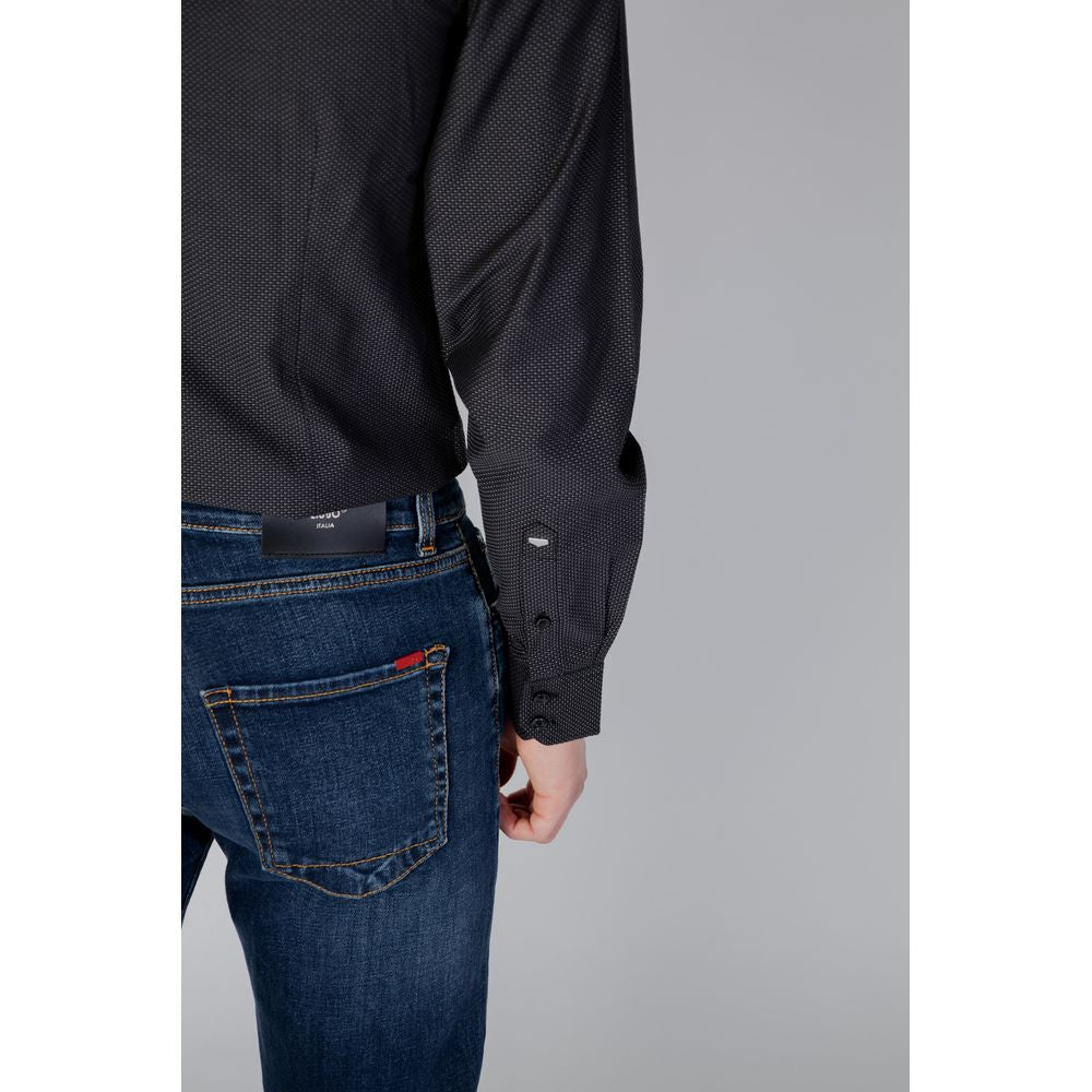 Back view of man wearing Antony Morato gray cotton long sleeve shirt from Autumn/Winter collection, paired with denim jeans.