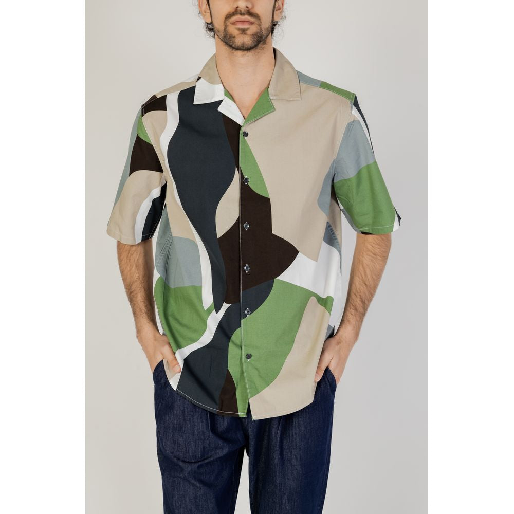 Man wearing Only & Sons green patterned short sleeve cotton shirt, perfect for spring and summer collections.