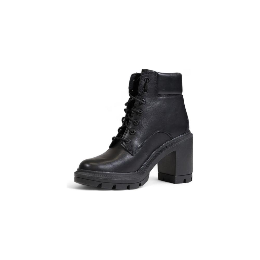 Women's black recycled leather sandal with chunky heel and lace-up design, perfect for fall and winter fashion.