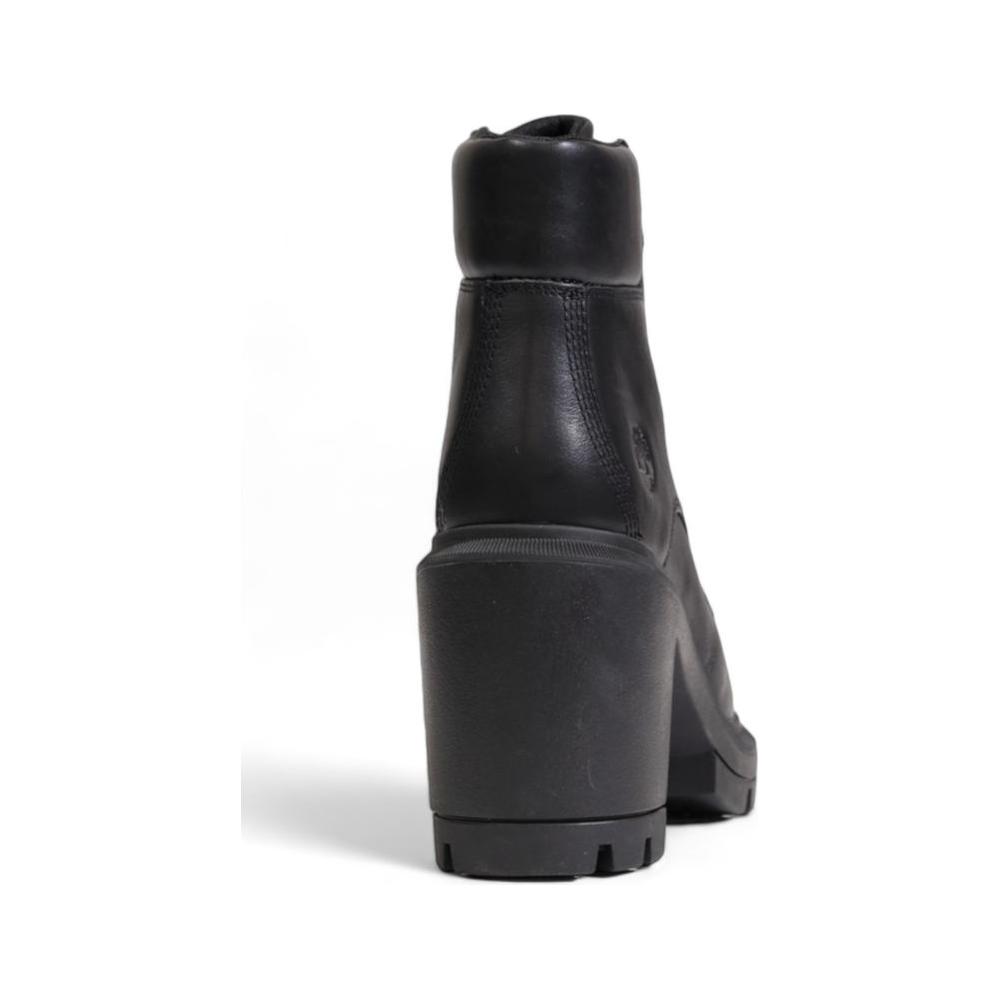 Rear view of Timberland black recycled leather women's sandal with a chunky heel, part of the Fall/Winter collection.