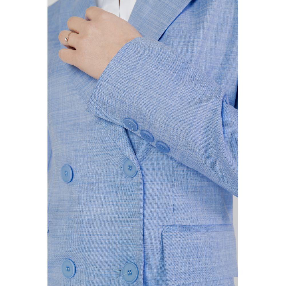 Close-up of Sandro Ferrone women's blue blazer from spring/summer collection with button details and elegant design.
