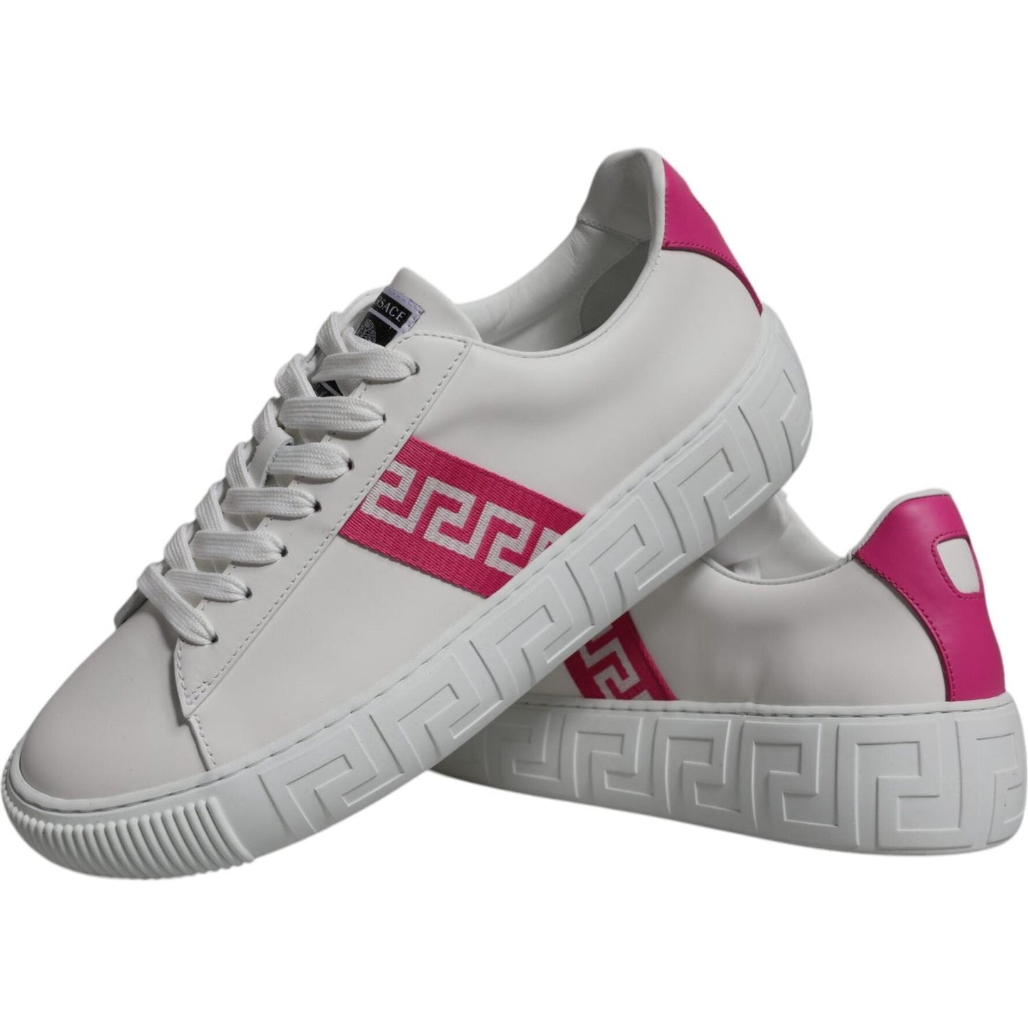 Versace white and pink Greca print platform low-top sneakers with logo patch and rubber sole, made of 100% calf leather.