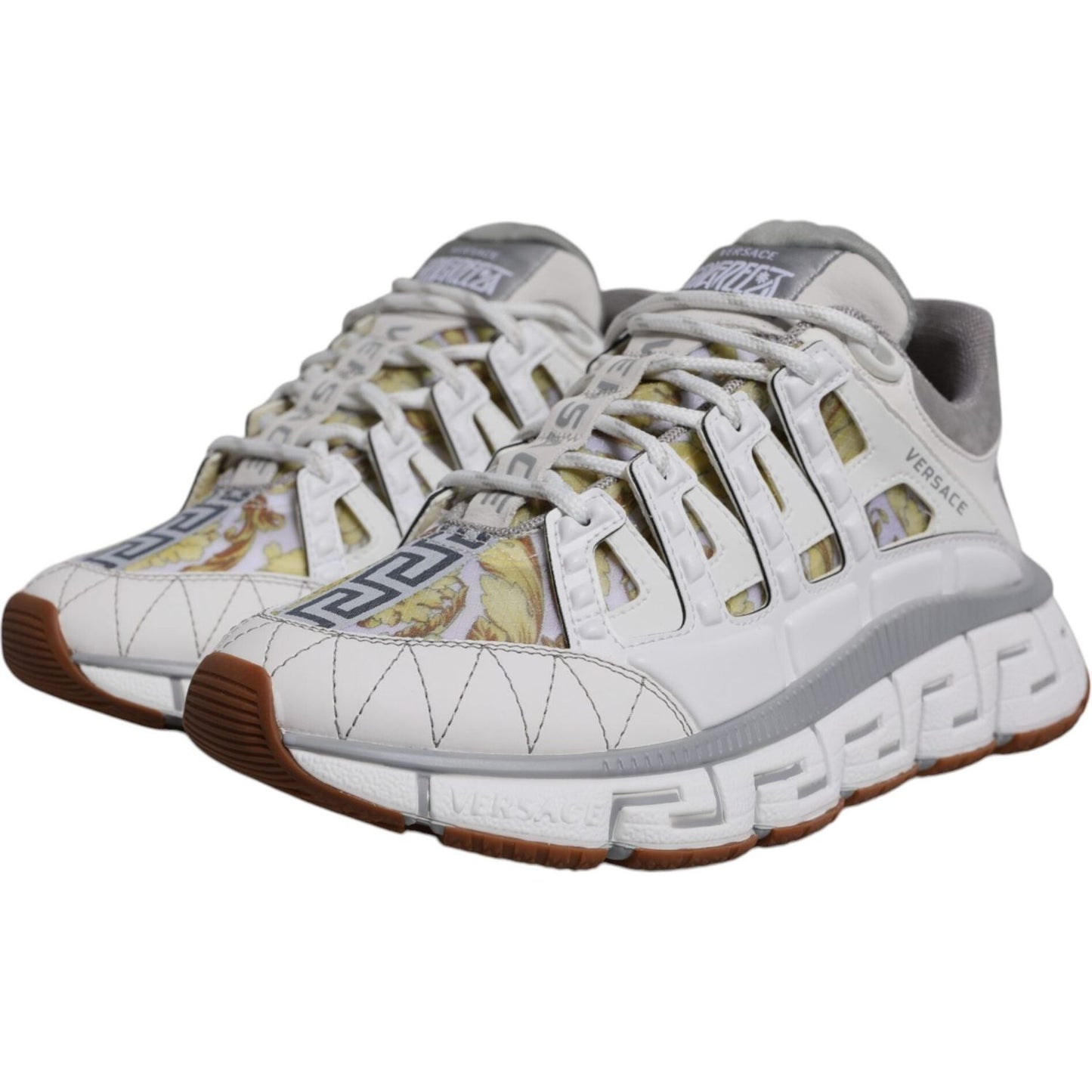 Versace White Trigreca Barocco Print Low Top Sneakers with three-dimensional Greca pattern and lace-up closure, made in Italy.