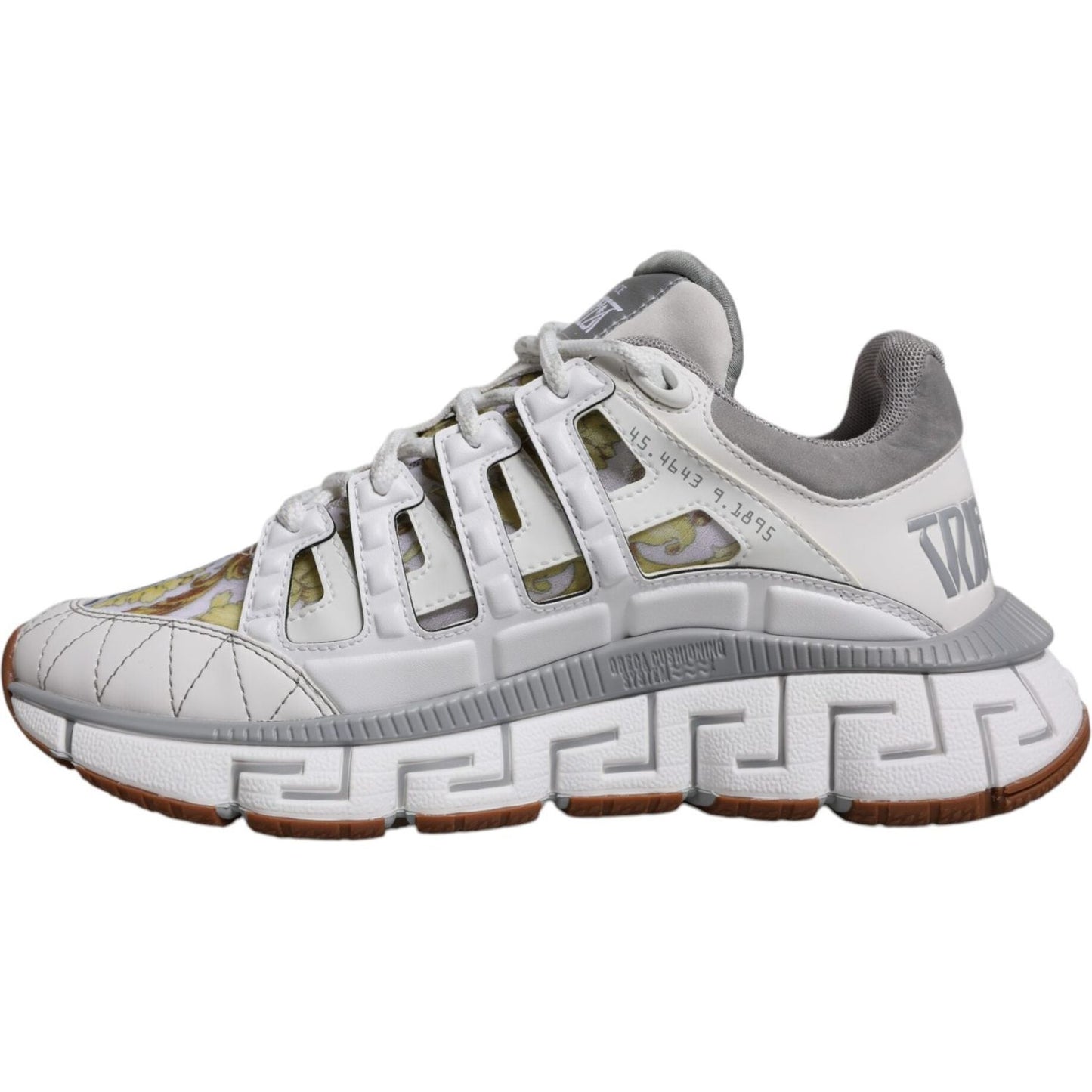 Versace White Trigreca Barocco Print Low Top Sneakers with signature Greca pattern and lace-up closure, made in Italy.