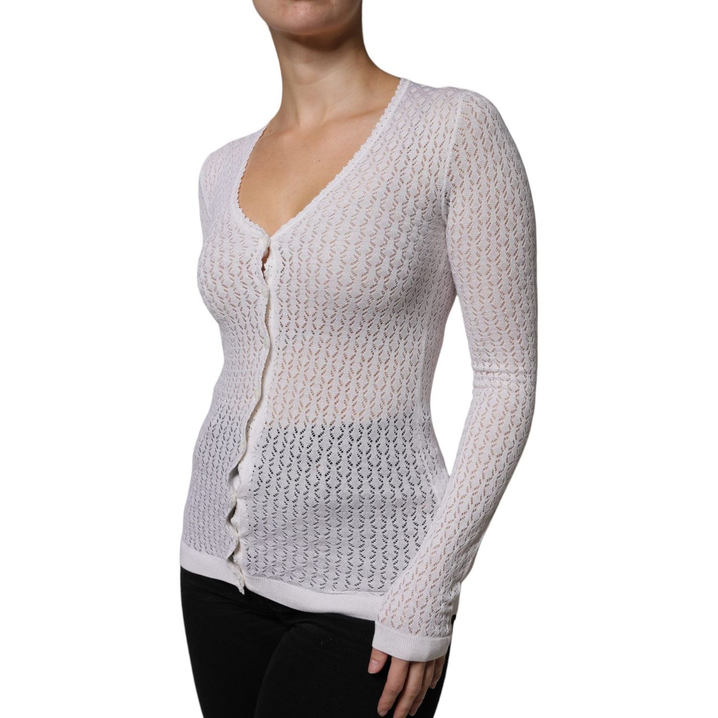 Dolce & Gabbana white silk button-down cardigan sweater with V-neck and long sleeves, showcased on a model, 100% authentic.