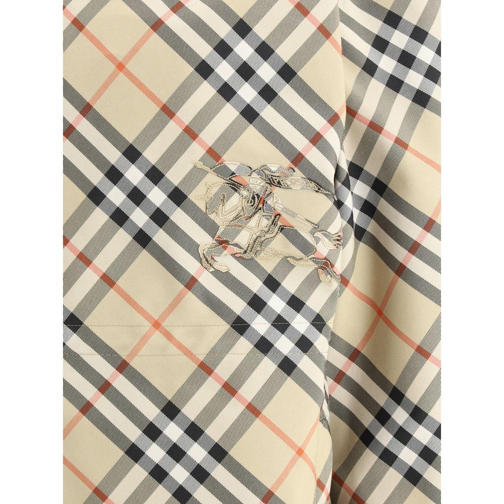 Burberry jacket with iconic Archive Check pattern and equestrian knight embroidery.