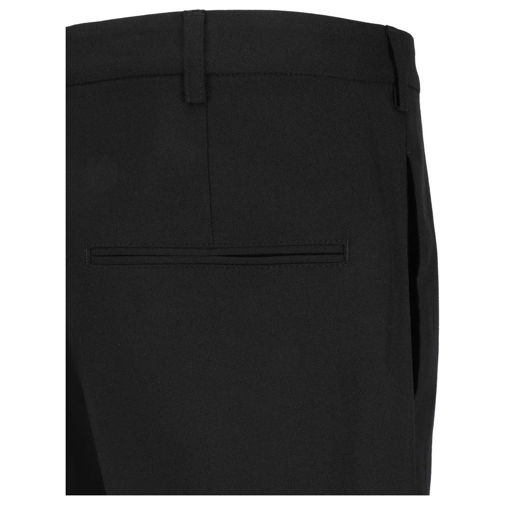 Back view of Marni Virgin Wool Pants showcasing welt pocket and waistband loops in monochrome fabric.