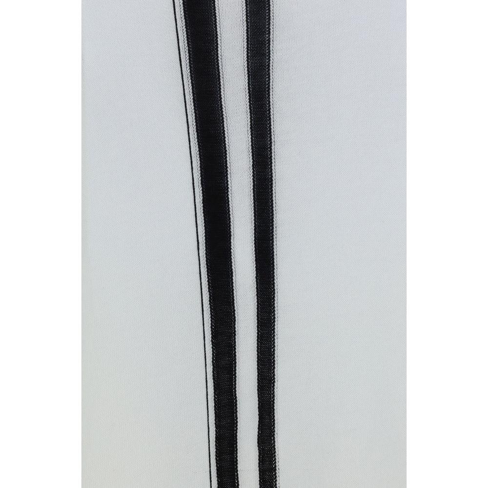 Close-up of Mordecai T-Shirt showing contrasting vertical bands on a monochrome cotton fabric background.