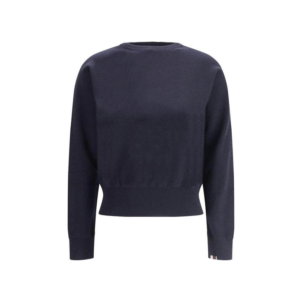 Extreme Cashmere Belle Sweater in deep navy, featuring ribbed crew neck, cuffs, and hem for a refined, elegant look and comfortable fit.