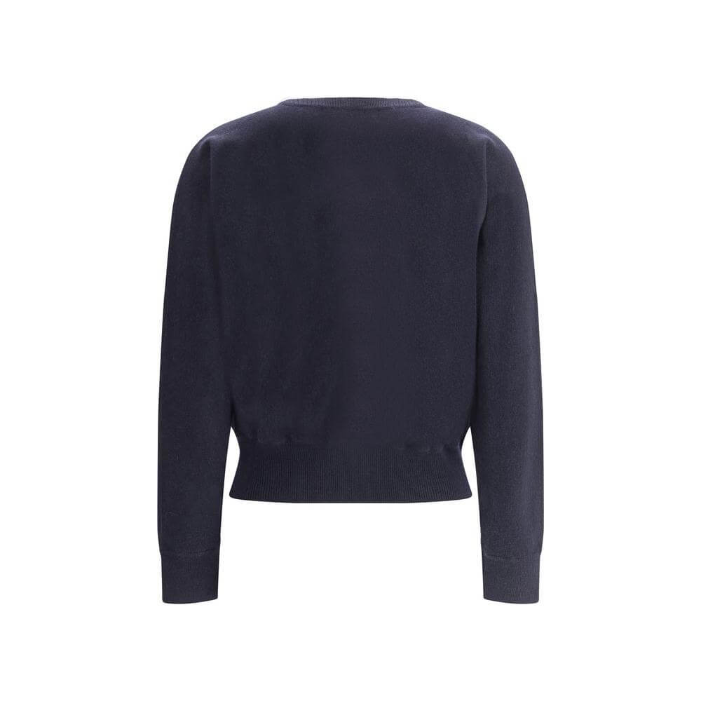 Back view of Extreme Cashmere Belle Sweater featuring ribbed crew neck, cuffs, and hem for an elegant and versatile look.