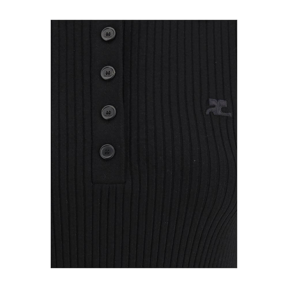 Black Courrèges polo shirt with ribbed texture, tone-on-tone buttons, and embroidered logo, showcasing slim fit and classic design.