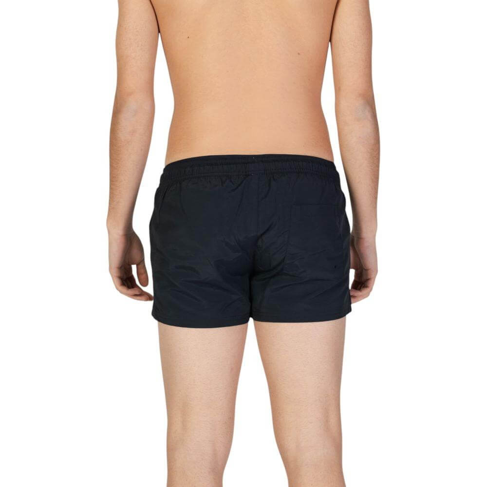 Back view of men's Hamaki-Ho black polyester swimwear, fall/winter collection, featuring 100% polyester composition.