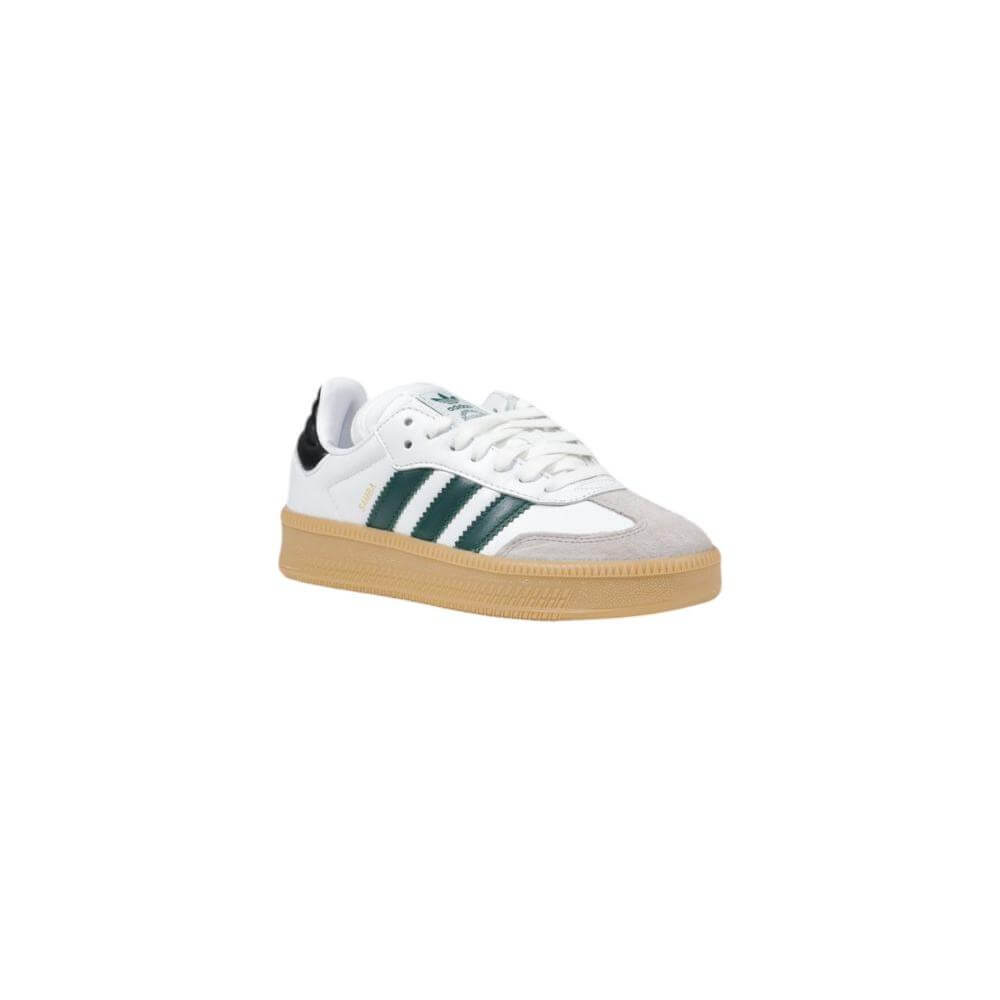 Adidas white leather sneaker for men, fall/winter collection, featuring iconic stripes and gum sole.