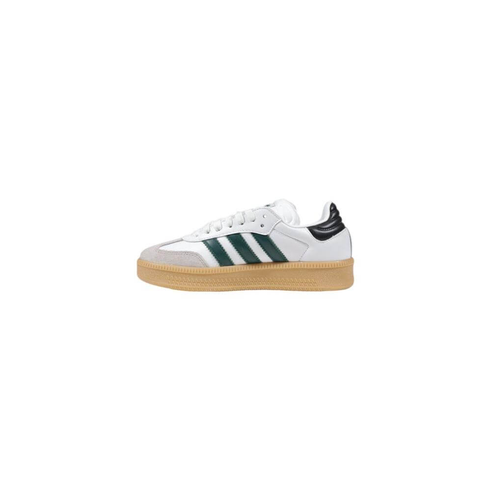 Adidas white leather men's sneaker for fall/winter collection, featuring green stripes and gum sole, ideal for casual wear.