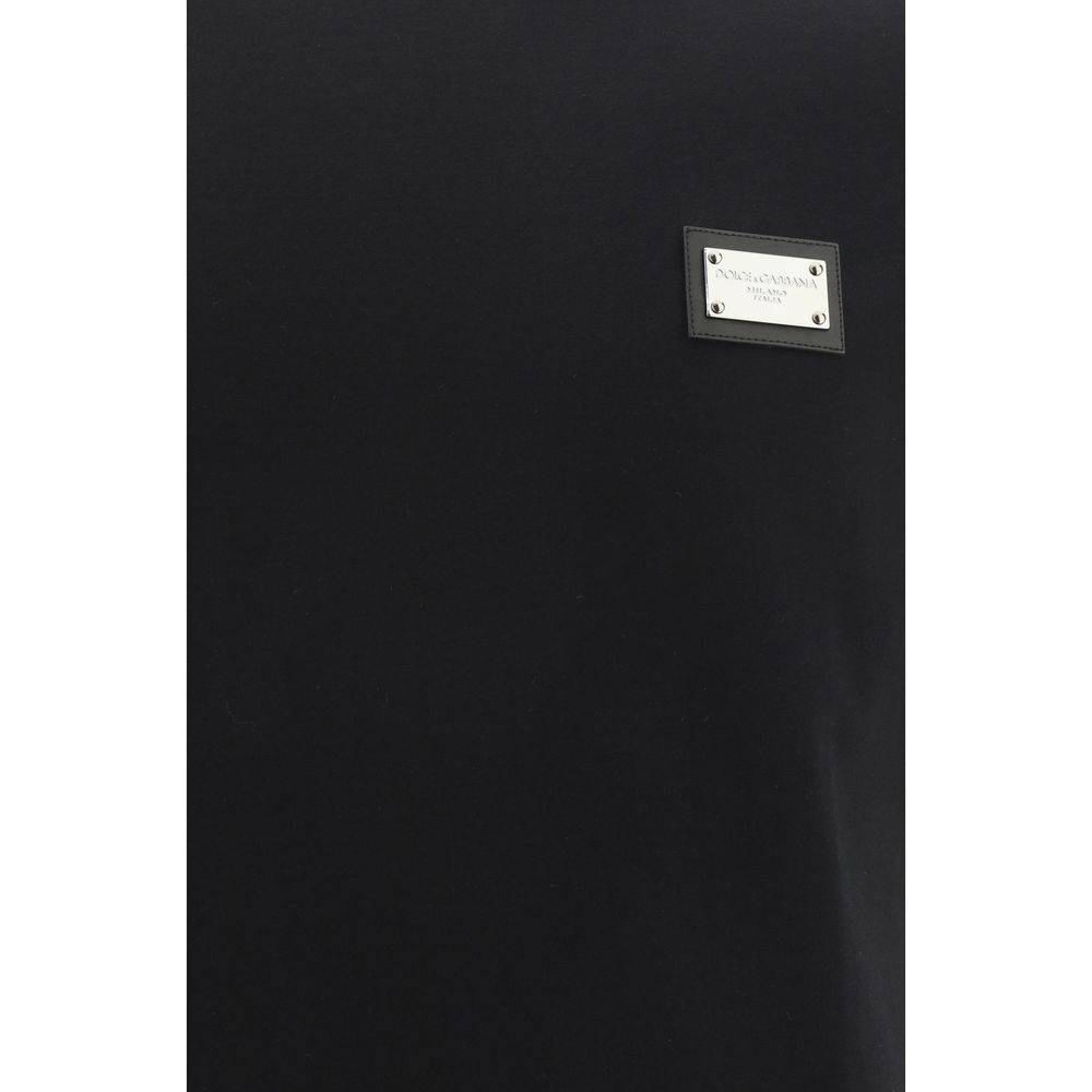 Dolce & Gabbana Black Cotton T-Shirt with metal D&G monogram plaque, oversized fit, made in Italy, AW25 season collection.