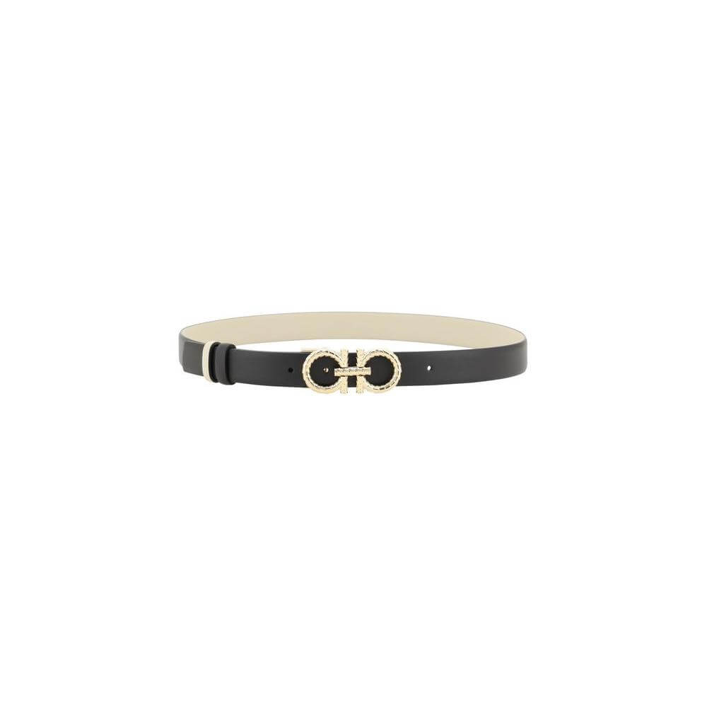 Ferragamo Gancini reversible leather belt with 3D buckle featuring iconic Gancini logo and snakeskin scales, versatile monochrome design.