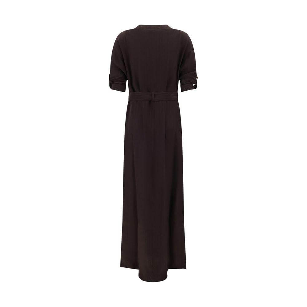 Back view of Tom Ford long dress with crew neck, adjustable sleeves, removable belt, and vertical pattern. Features back slit.
