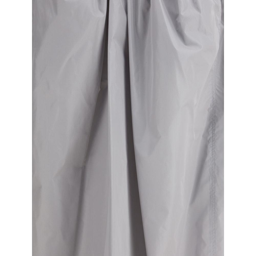 Close-up of Fabiana Filippi Midi Trench Skirt showcasing elegant grey fabric with sustainable drip protection, ideal for any weather.