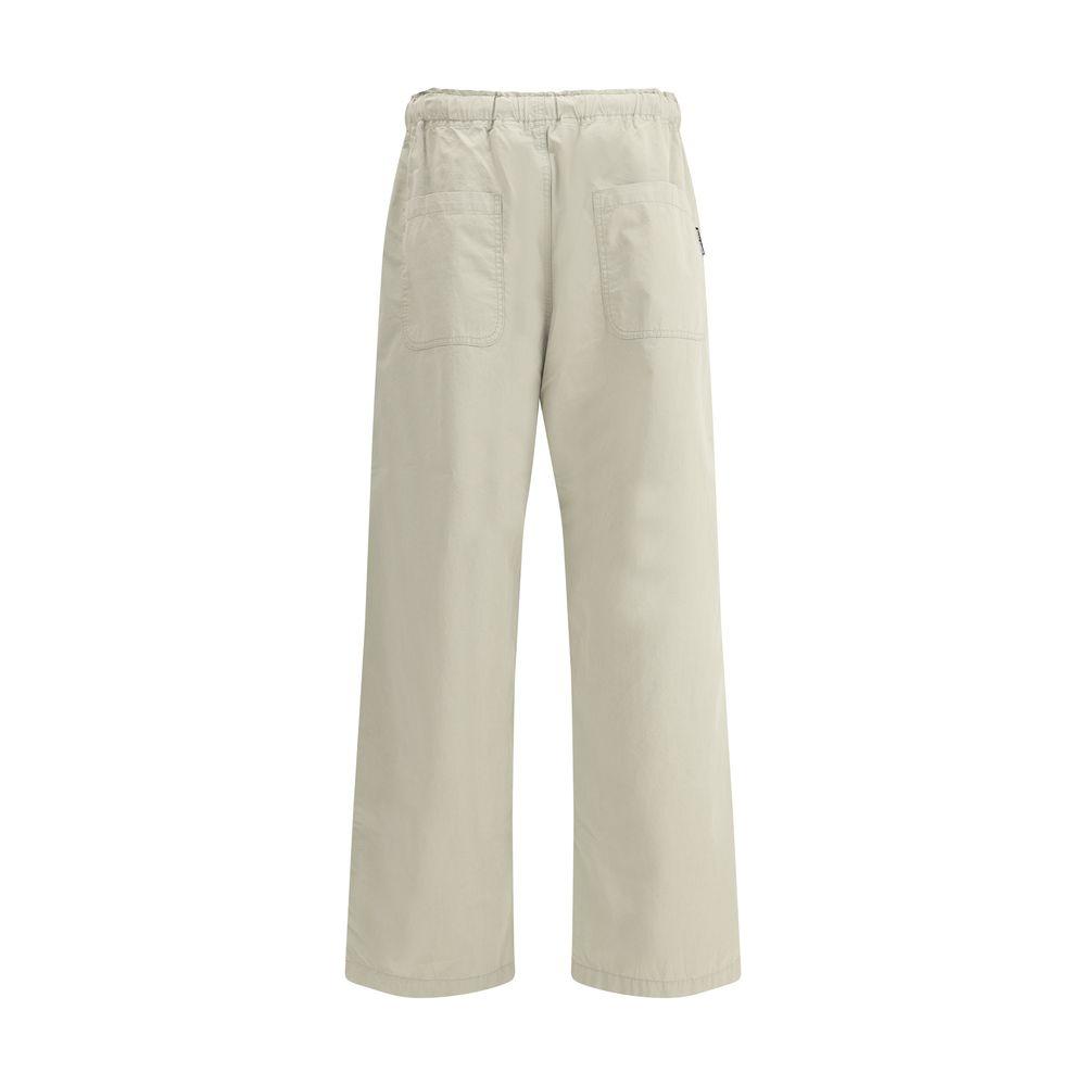 Palm Angels cotton waist pants with elastic waistband, wide-leg style, and front pockets, featuring iconic monogram detailing.