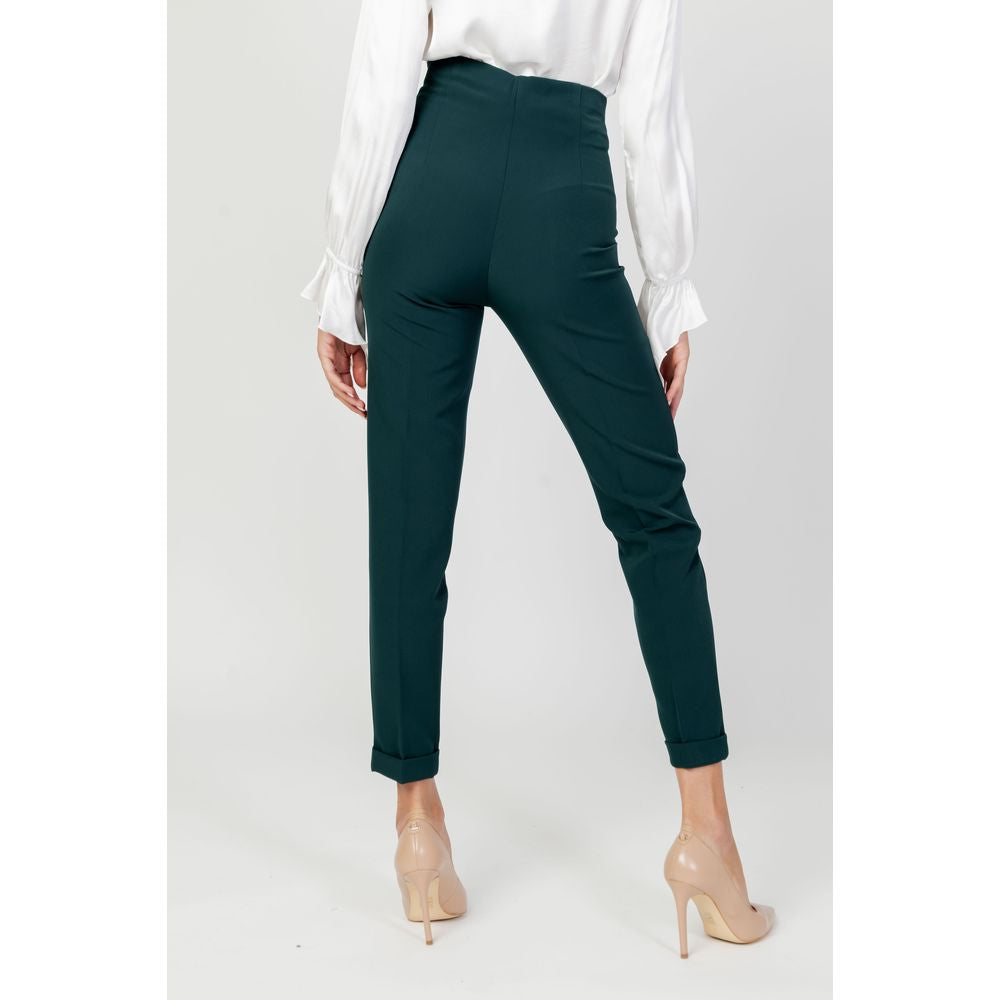 Back view of Sandro Ferrone green polyester cigarette pants for women, featuring autumn/winter collection style.