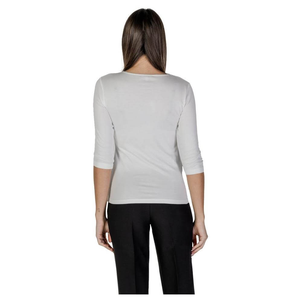 Back view of woman wearing Street One white cotton short-sleeved T-shirt, part of spring/summer collection, 50% cotton, 50% modal.