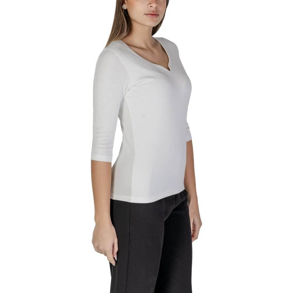 Woman wearing Street One white short-sleeved cotton-modal blend T-shirt, ideal for spring/summer collection.