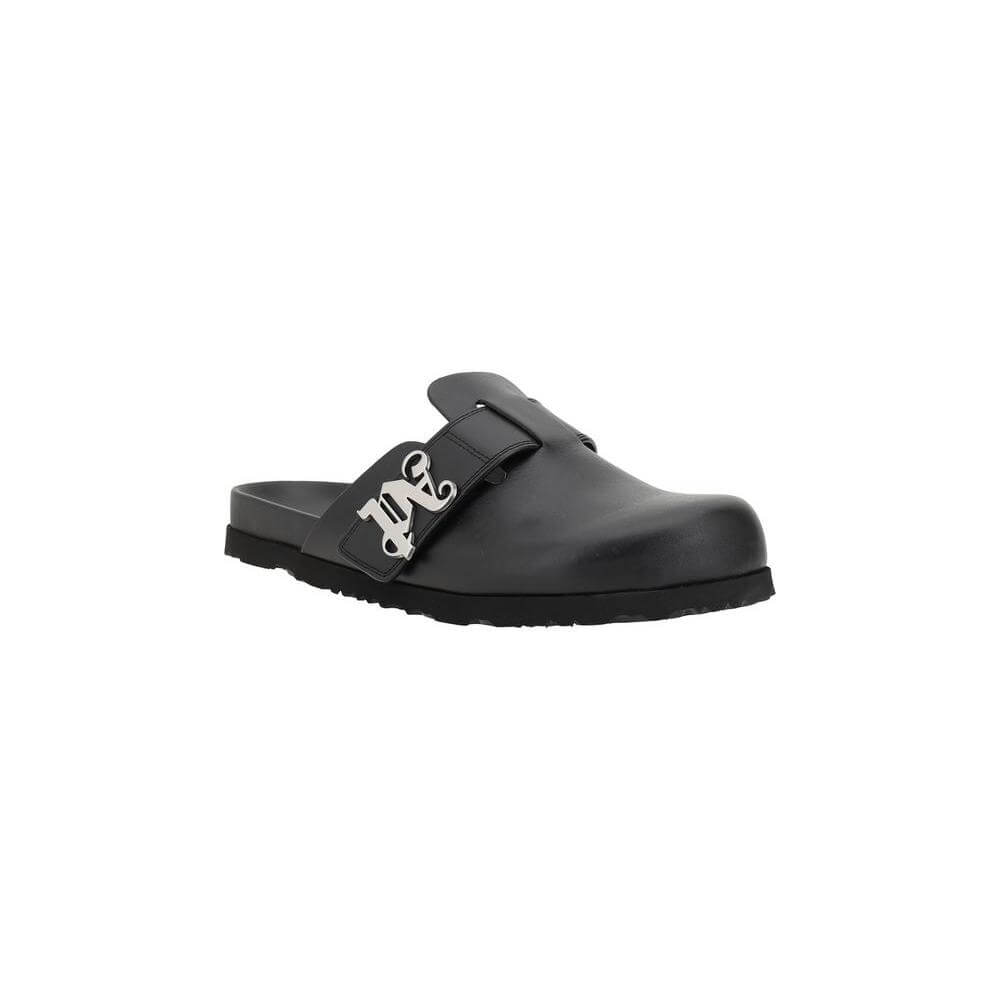 Palm Angels leather mules with round toe, slip-on design, wide strap, and iconic plaque logo for modern style and comfort.