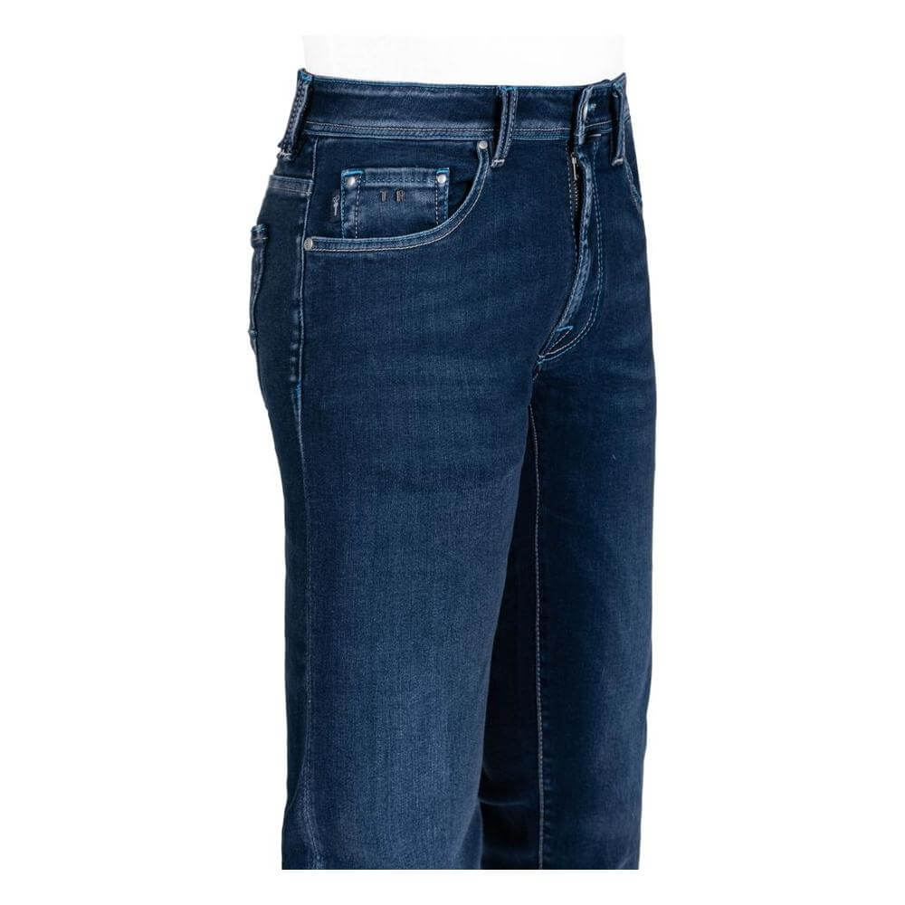 Tramarossa blue cotton men's jeans with classic five-pocket design, showing craftsmanship and luxury detail with a suede logo patch.