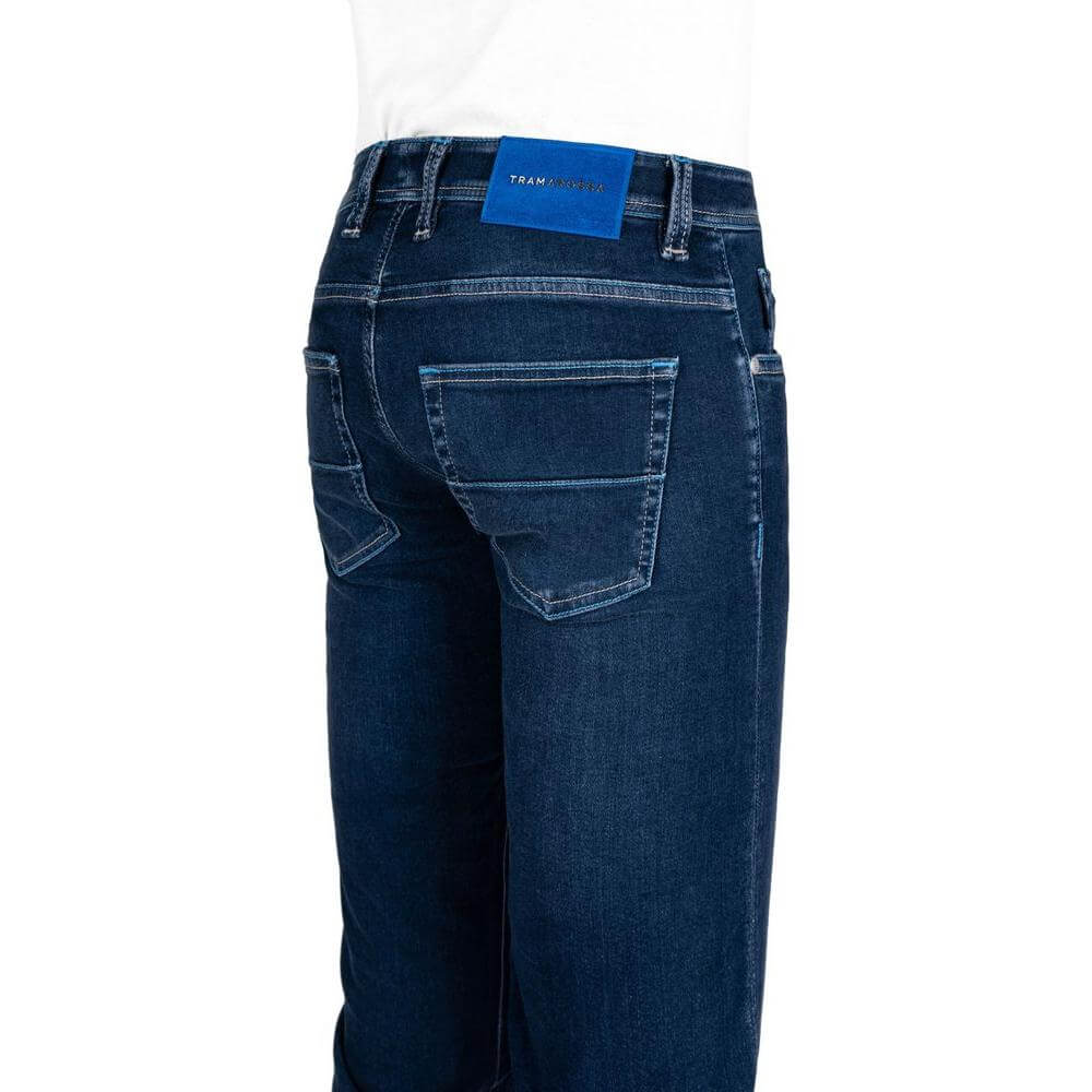 Tramarossa blue cotton men's jeans with suede patch and metal logo, featuring five-pocket design and stretch fabric for comfort.