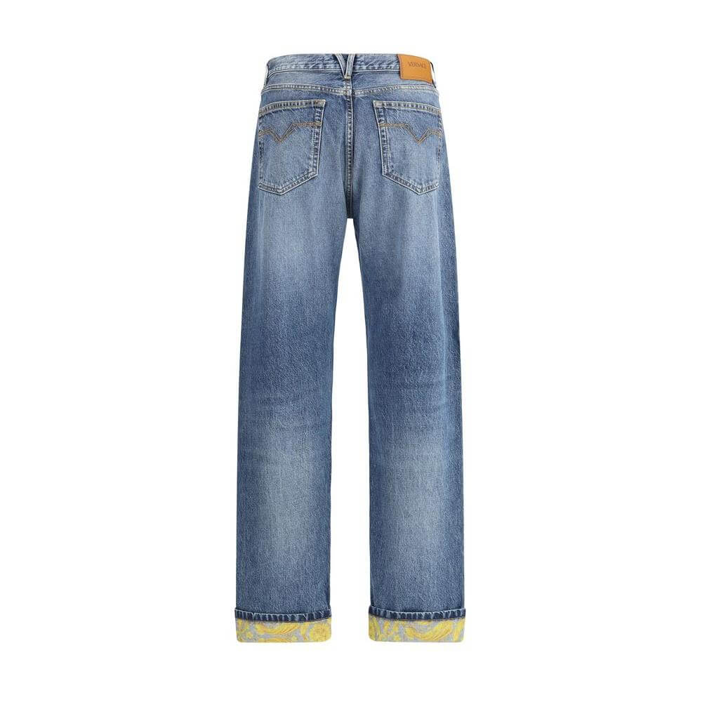 Alt Tag: Versace Barocco Turn-Up Jeans with iconic patterned cuffs, featuring high waist and five-pocket design for elegant style.