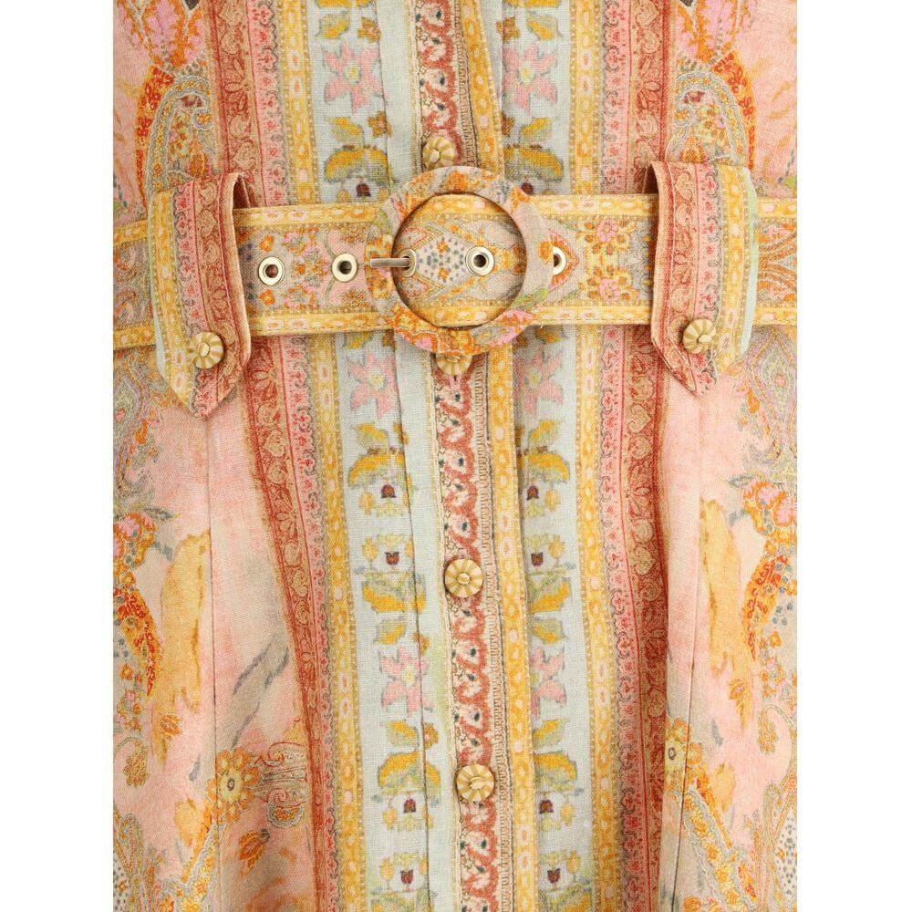 Close-up of Zimmermann Acacia Midi Dress belt with floral buttons and all-over floral pattern in pink and pastel hues.