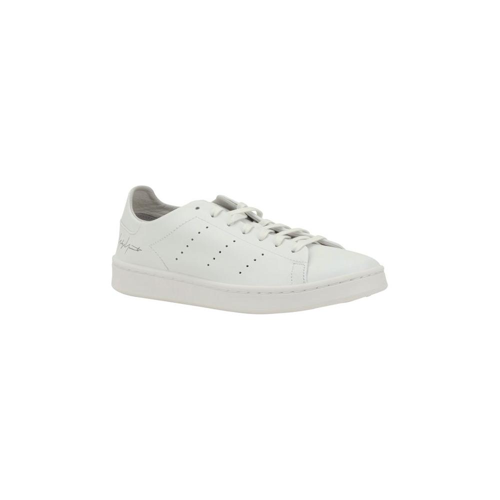 Y-3 Stan Smith leather sneakers with perforated sides, lace-up closure, and Yohji Yamamoto signature on the heel.