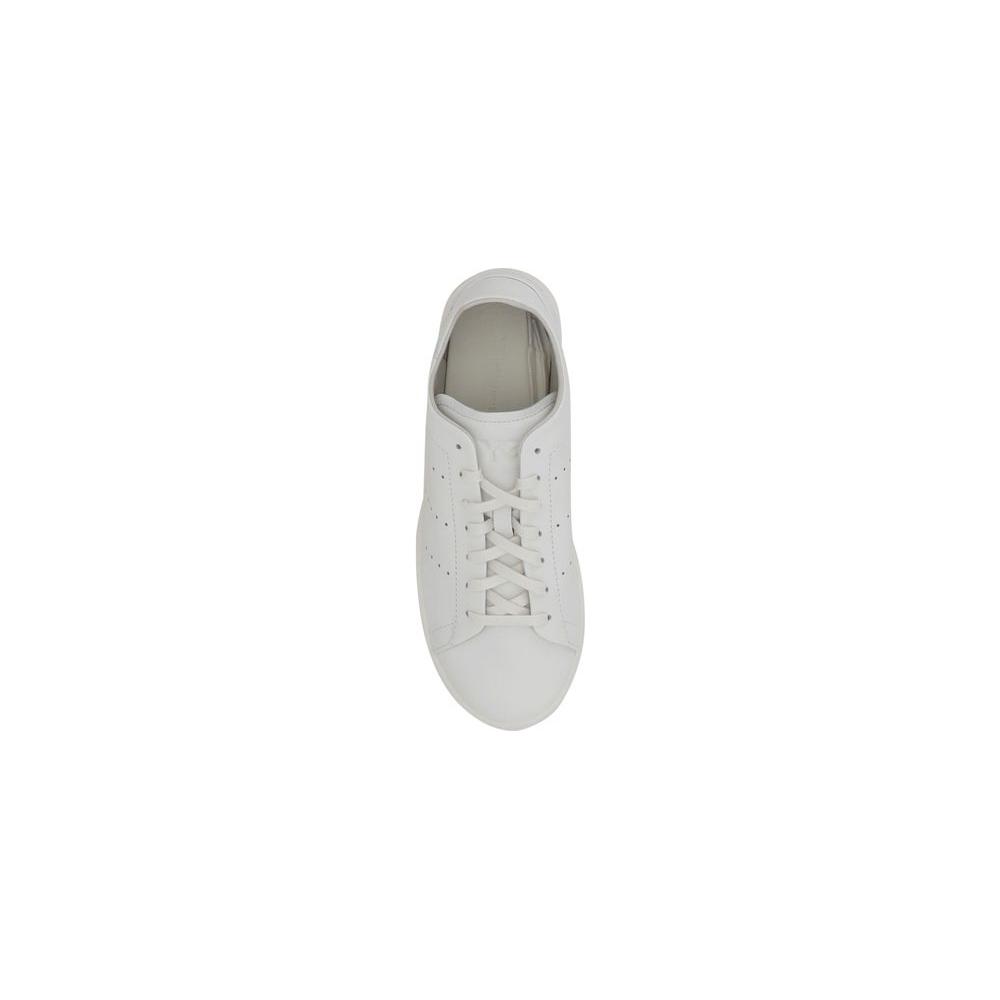 Top view of Y-3 Stan Smith leather sneaker with lace-up closure and perforated panels for ventilation.