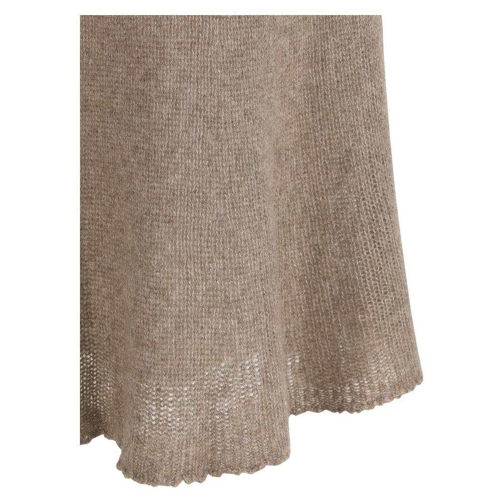 Close-up of Lisa Yang Kelsy cashmere skirt in beige, featuring elasticized waistband and soft knit texture.