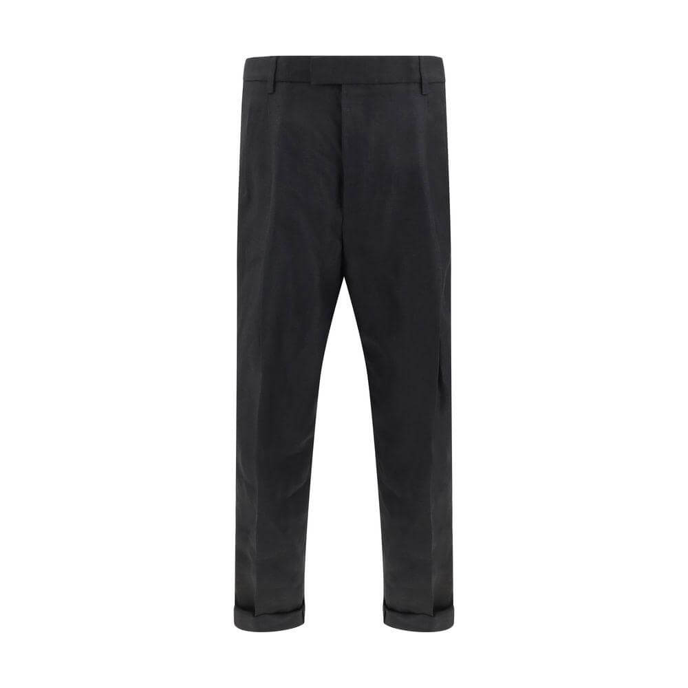Dolce & Gabbana black linen pants with tailored design, featuring balloon leg silhouette, front zipper, and button closure.