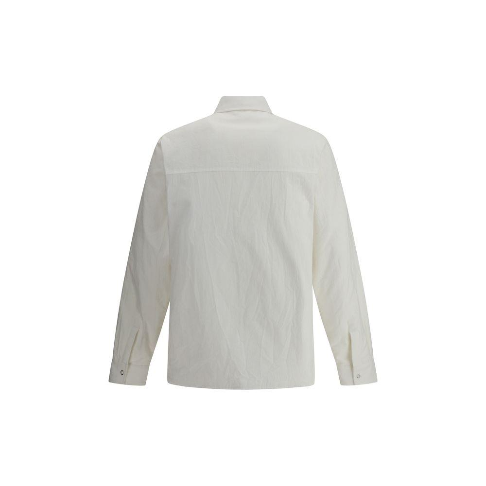 Back view of Moncler x FRGMT cotton shirt jacket featuring classic collar and snap button closure in white.