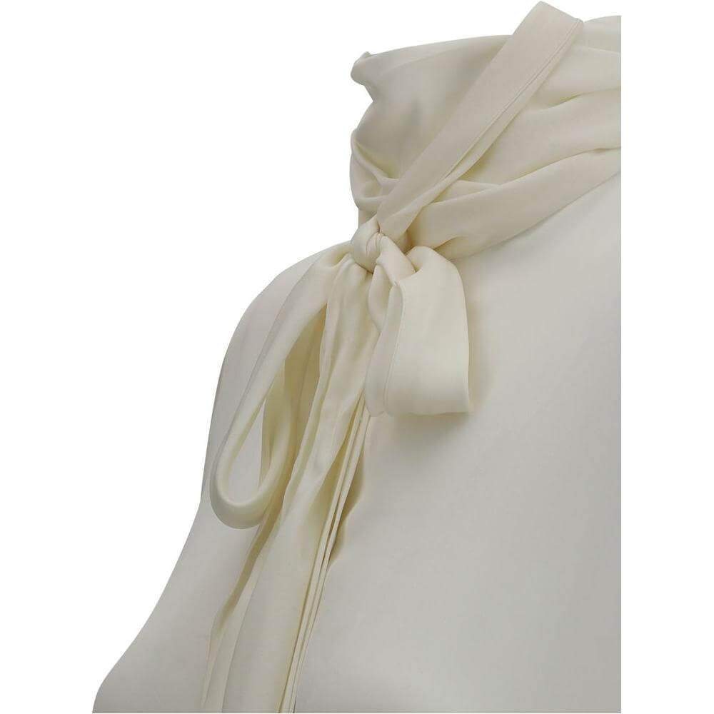 Close-up of Khaite Tash Shirt's silk self-tie sash collar, showcasing luxurious semi-sheer fabric and elegant design.