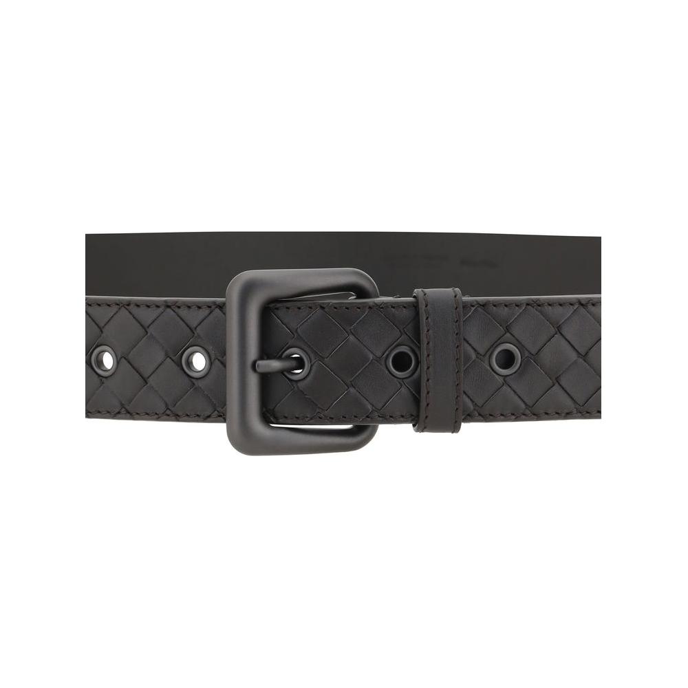 Bottega Veneta leather belt with iconic intrecciato weave and square buckle, showcasing elegance and modern refinement.