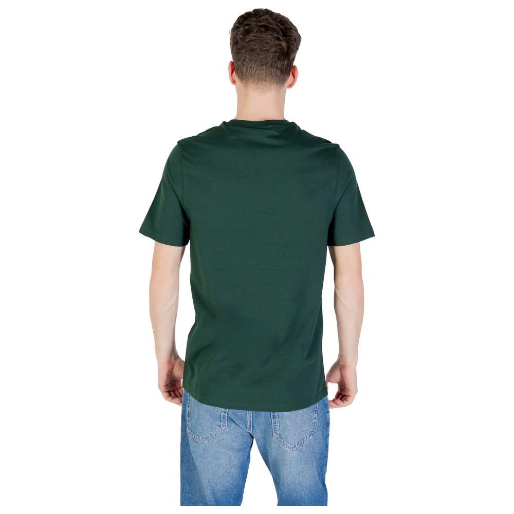 Back view of a man wearing a Lyle & Scott green cotton T-shirt with short sleeves, showcasing a casual style.