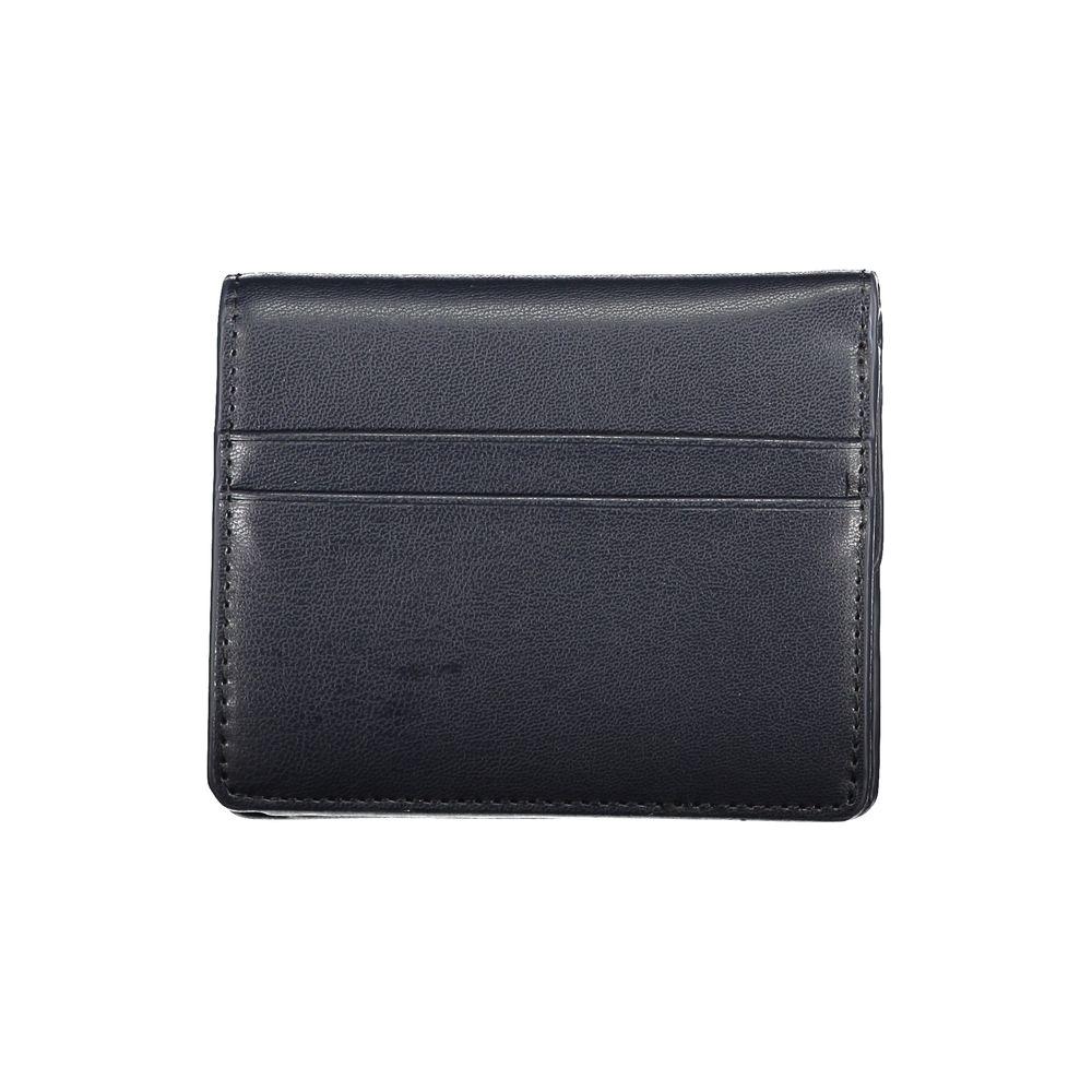 Tommy Hilfiger blue polyethylene wallet with card slots, coin purse, and snap closure.