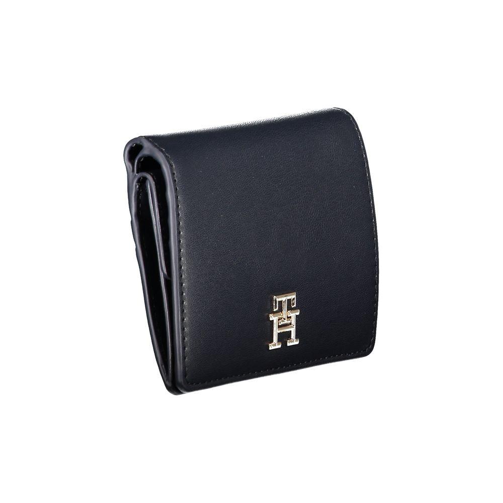 Tommy Hilfiger Blue Polyethylene Wallet with card slots, coin purse, snap closure, and logo emblem.